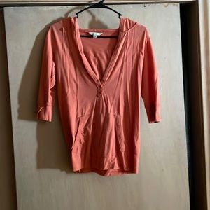 3/4 sleeve Large Rubbish brand hooded tee.